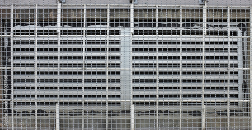 Metal industrial wall with ventilation grille