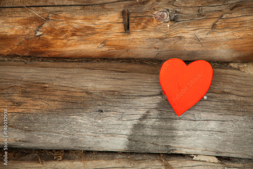 Red heart on a rustic wooden background. St. Valentine's Day Red heart on a rustic wooden background. St. Valentine's Day
