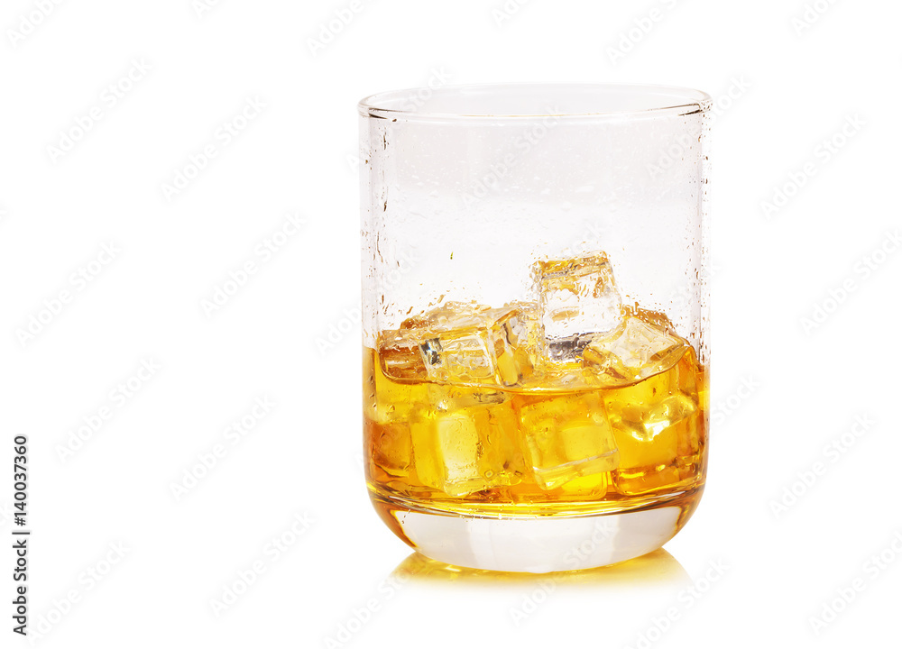Glass of scotch whiskey and ice on a white background. Glass of scotch whiskey and ice on a white background.