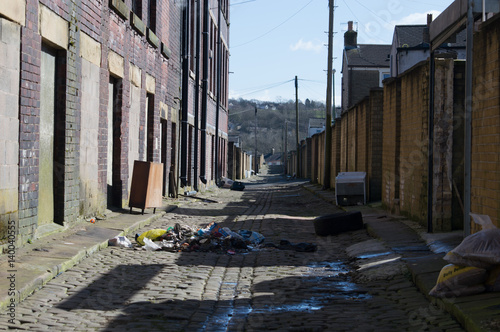 Cobbled back alley in a northern town photo