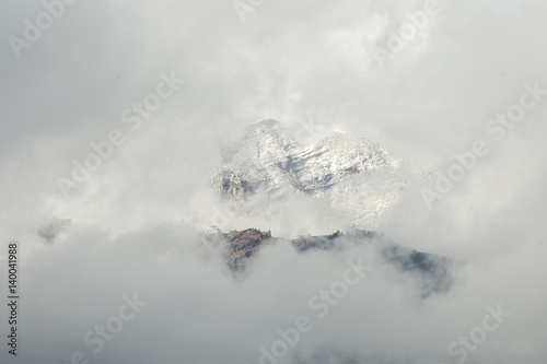 Atmospheric clouds of fog cover the top of the mountain. Crimea. Yalta. Ay Petrinskaya Yaila