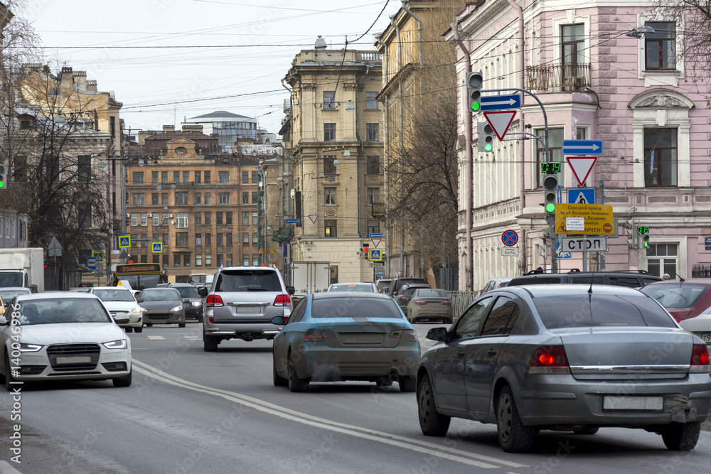 cars driving down city street, Saint Petersburg, buildings