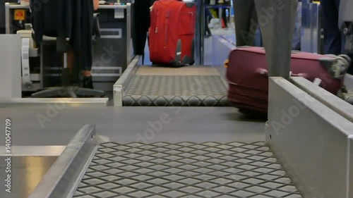 luggage at Point of checking the luggage scanner. Baggage check-in ,X-ray machine band on the on conveyor belt at the airport counter.