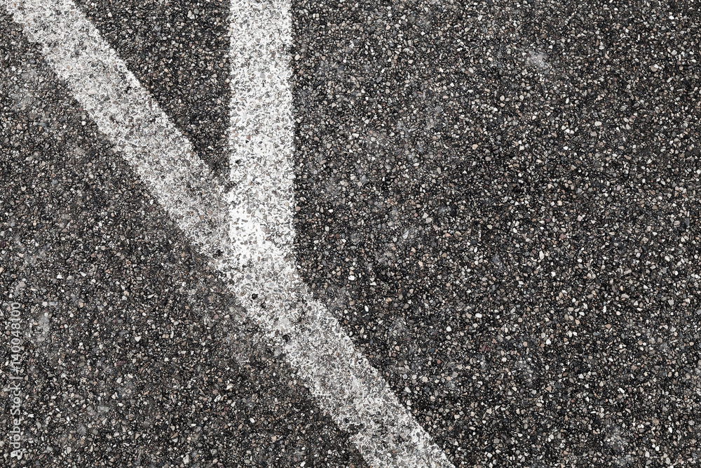 Corner of white lines on asphalt