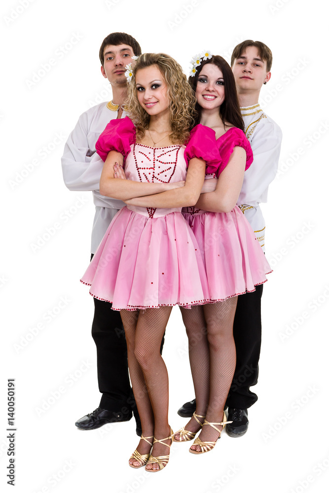 Dance team wearing a folk russian costume posing Dance team wearing a folk russian costume posing