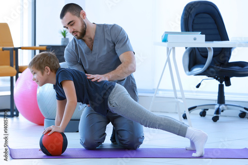 Physiotherapist working wit...