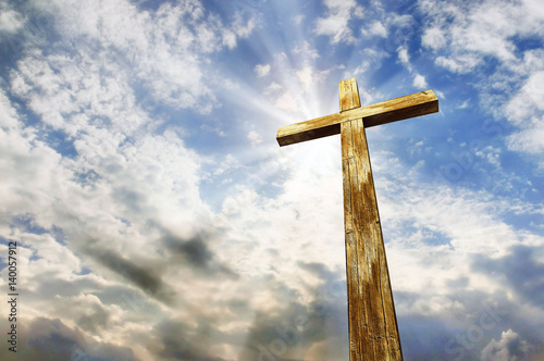 Fototapeta Cross against the sky. Happy Easter. Christian symbol