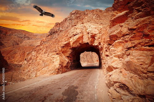 way through the cave in the mountain. photo