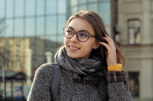 Girl is walking around the city