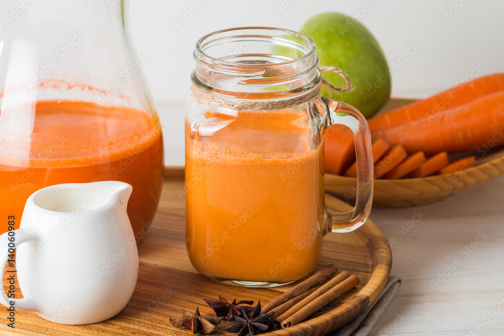 Fresh carrot juice in a glass Fresh carrot juice in a glass