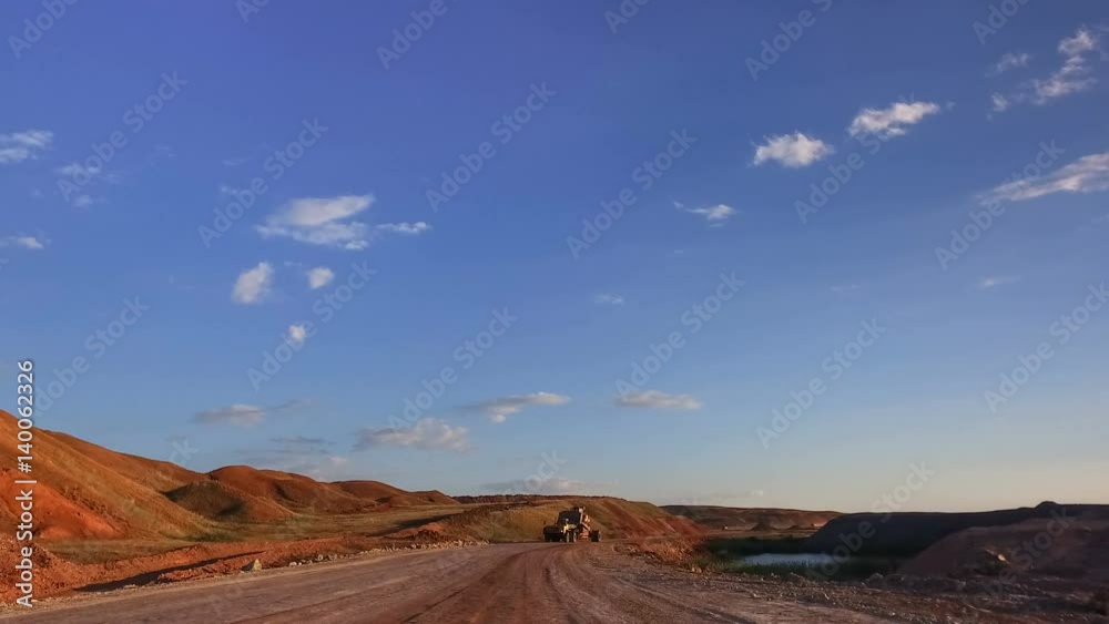 On the way to the quarry. Moving camera. On-coming tow truck with the bulldozer. On the way to the quarry. Moving camera. On-coming tow truck with the bulldozer.