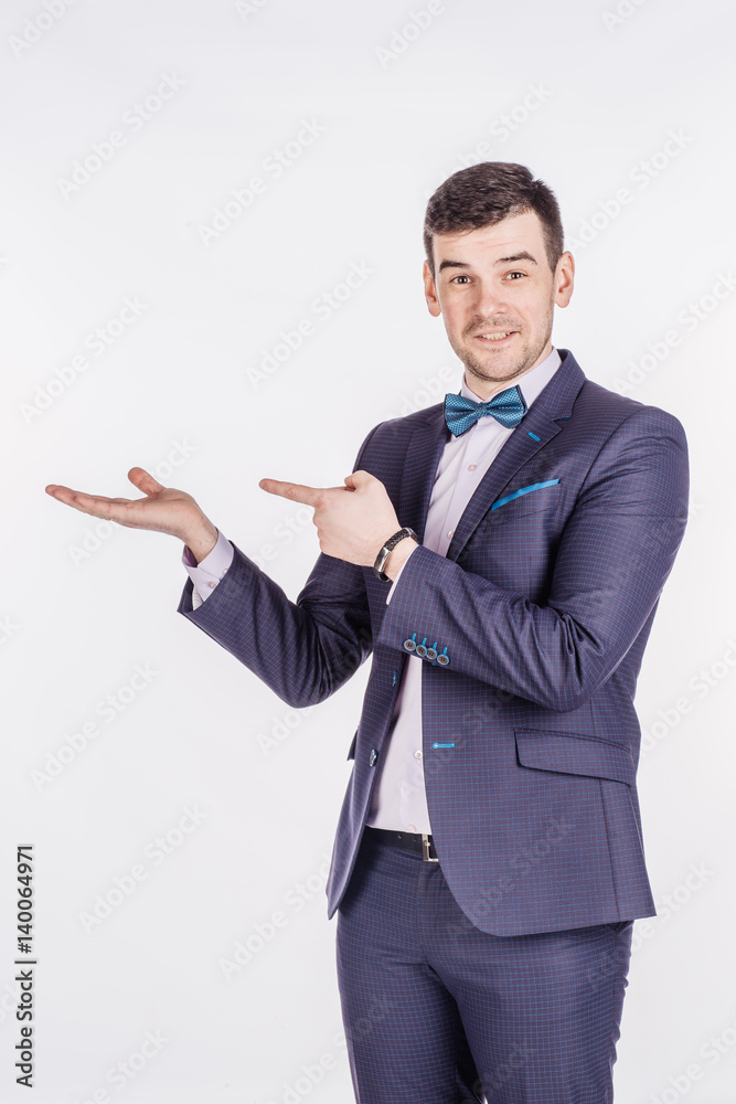 man presenting or showing something your text or product. human emotion expression and lifestyle concept. image on a white studio background. man presenting or showing something your text or product. human emotion expression and lifestyle concept. image on a white studio background.