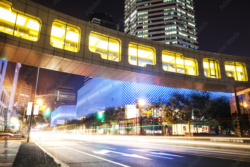 Fototapeta premium traffic on road and modern buildings