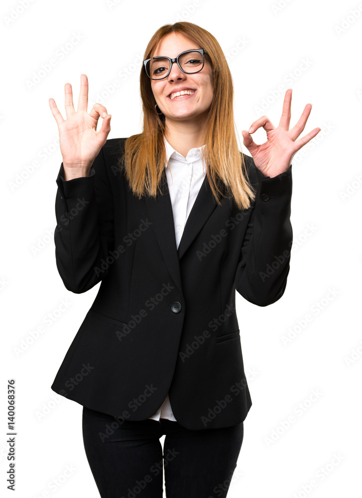Young business woman making OK sign Young business woman making OK sign