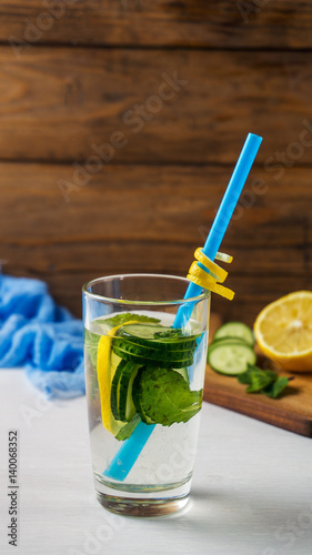 Water detox with fresh cucumber and lemon. Healthy drink