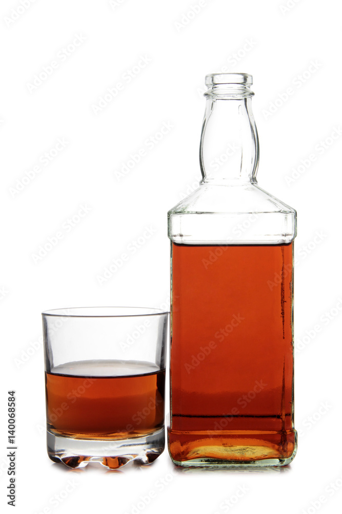 Glass with brandy and whiskey on white background Glass with brandy and whiskey on white background