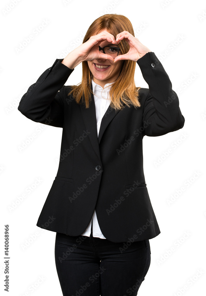 Young business woman making a heart with her hands Young business woman making a heart with her hands