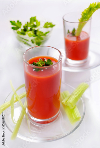 Wallpaper Mural Tomato juice in glasses with parsley and celery. Fresh juice of tomato. Torontodigital.ca