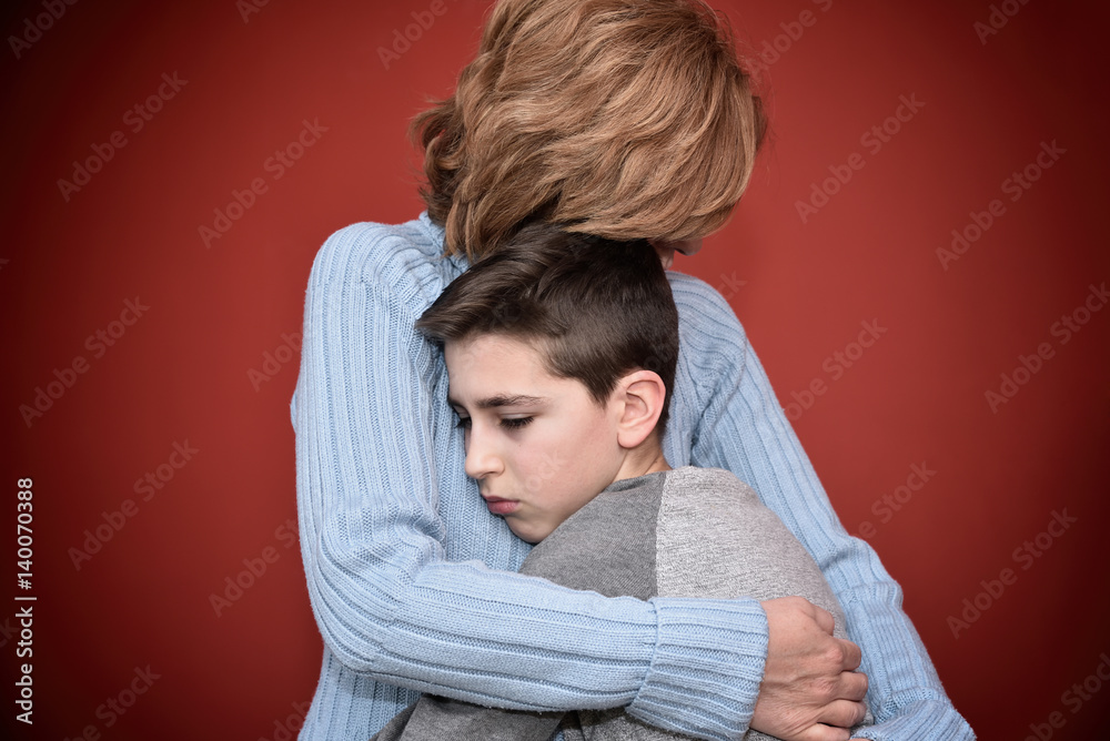 young boys hugging