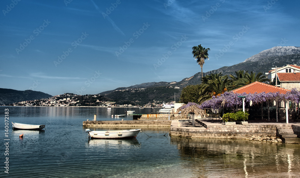Pier with couple small boats, Kumbor, Montenegro