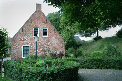 Old houses in the forrtess village of Bourtange photo