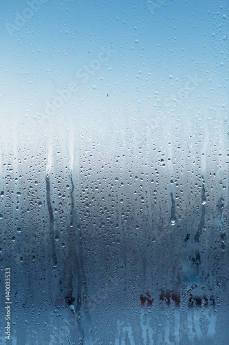 Autumn rain, the inscription on the sweaty glass mark sunrise