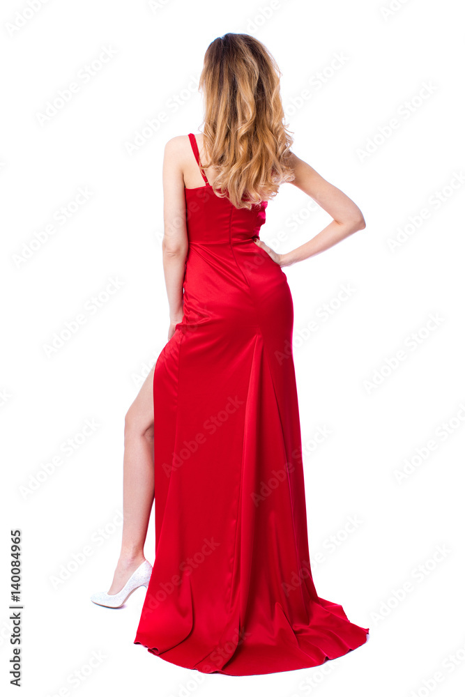 Young beautiful happy blonde woman in red dress