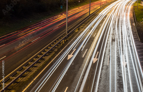 Close up on Light trails on highway during evening rush hour