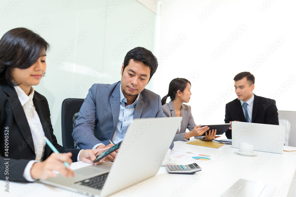 Businesspeople interacting at meeting Businesspeople interacting at meeting