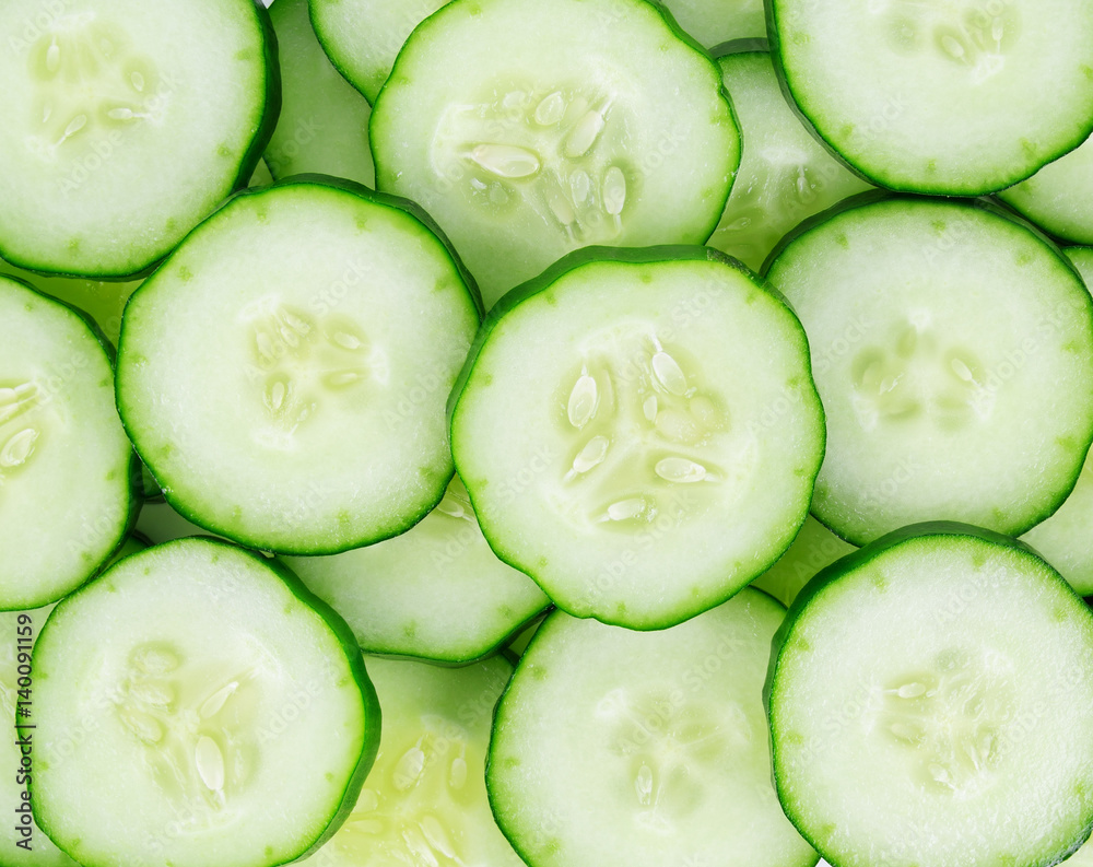 Fresh cucumber slices background. Fresh cucumber slices background.