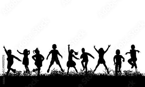  isolated, silhouette of children jumping on the grass