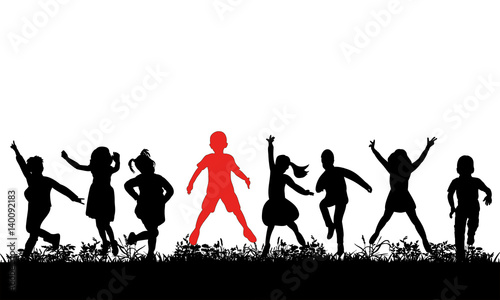  silhouette of children jumping on the grass