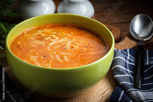 Bild auf Leinwand Homemade tomato soup with noodles.