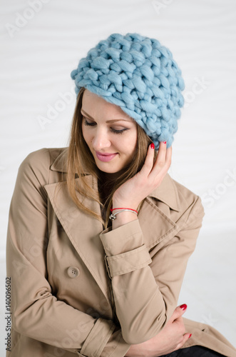 Young sexy woman in blue fashionable merino hat