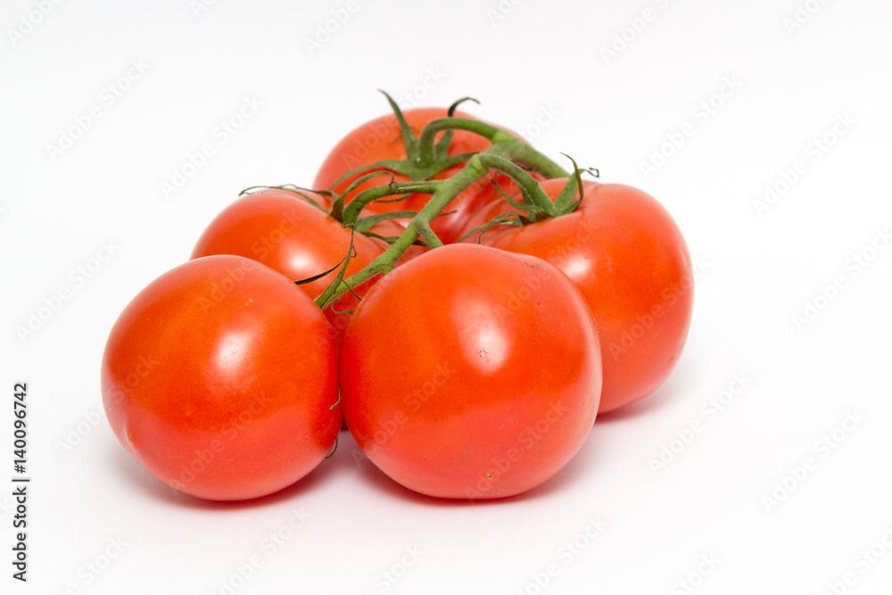 group of fresh red tomatoes isolated on white background group of fresh red tomatoes isolated on white background