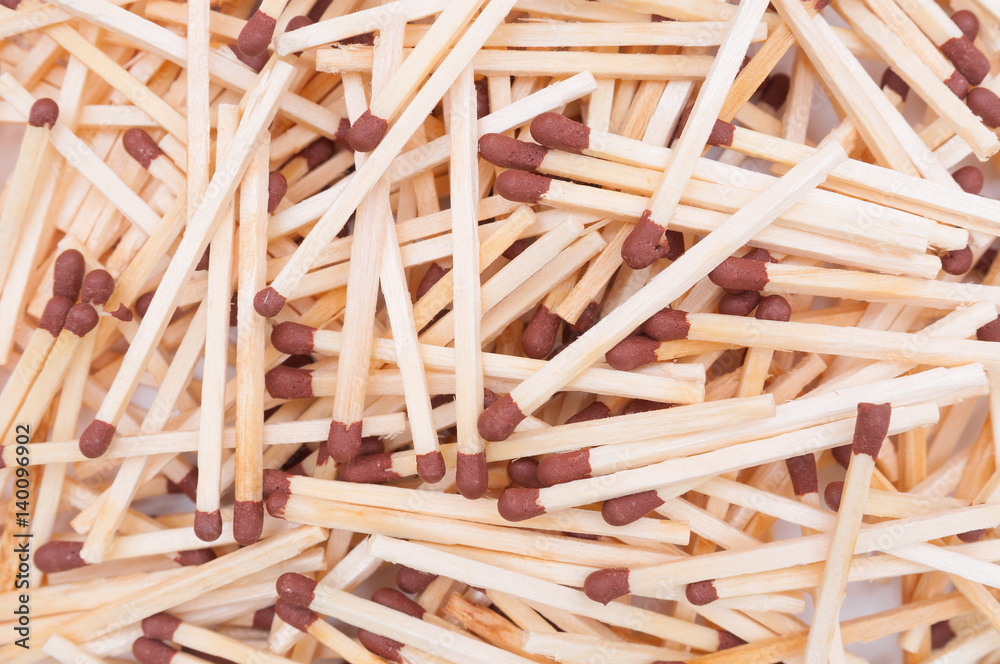 Heap of matches with brown heads closeup Heap of matches with brown heads closeup