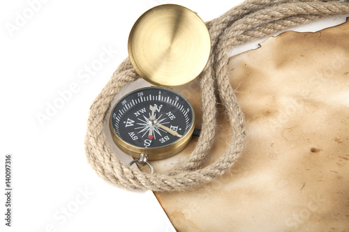 compass, old paper and rope