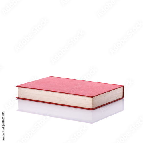 Old book with empty blank cover. Studio shot isolated on white
