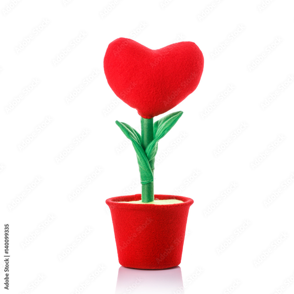 Artificial red heart flower. Studio shot isolated on white Artificial red heart flower. Studio shot isolated on white