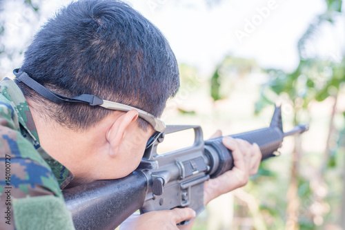 solider sniper asia training shoot gun M16 outdoors