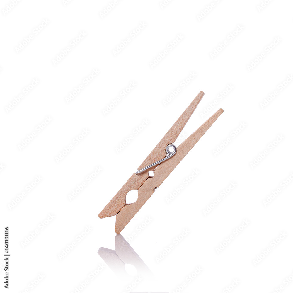 Wooden clothes pin. Studio shot isolated on white Wooden clothes pin. Studio shot isolated on white