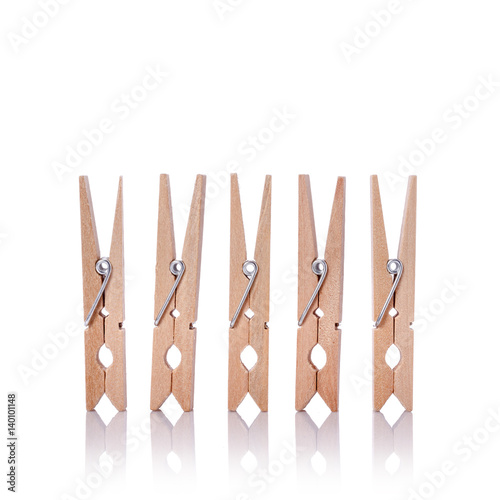 Wooden clothes pin. Studio shot isolated on white