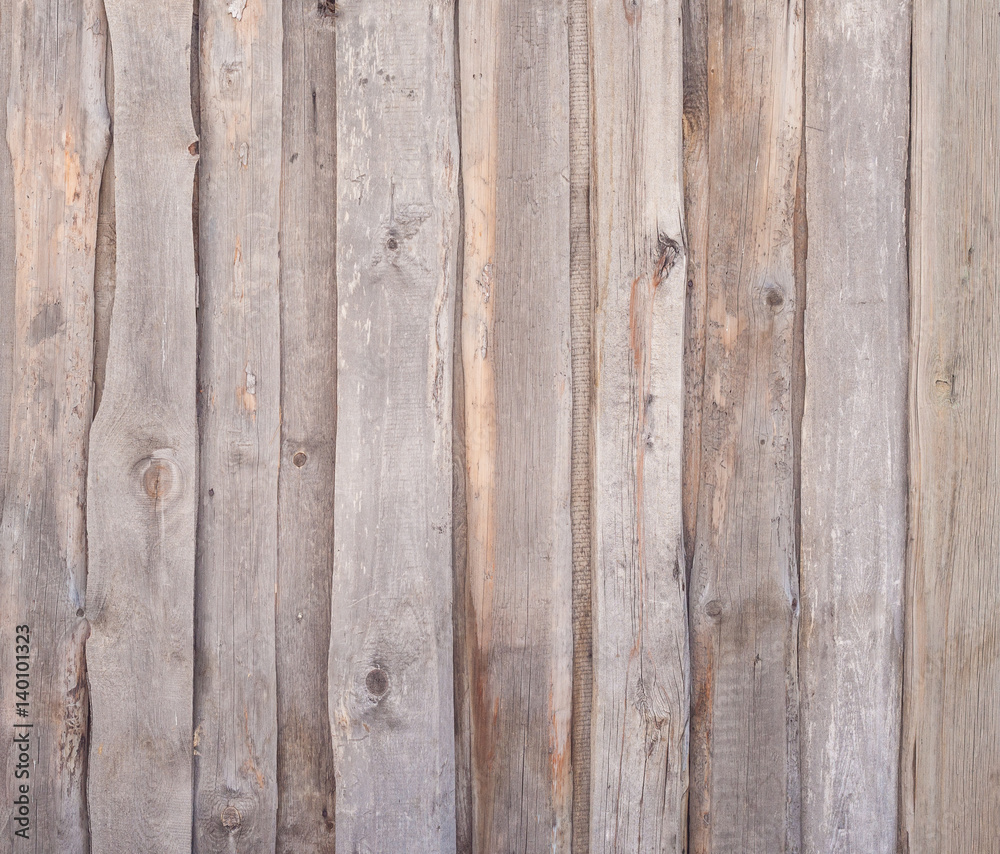 Naklejka premium Fence of old gray boards.