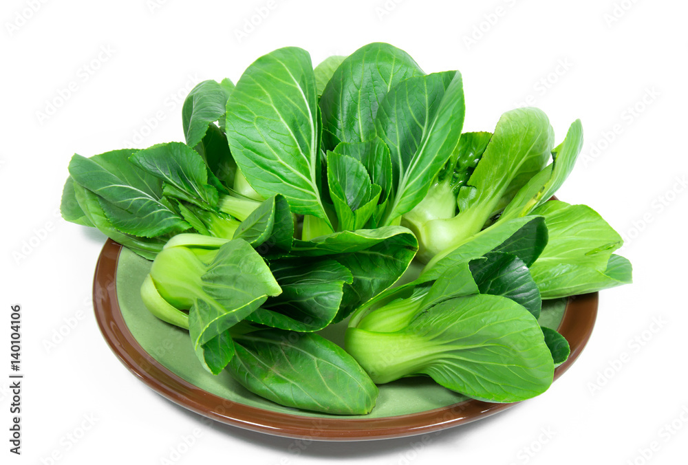 Fresh cabbage in a plate isolated on white background Fresh cabbage in a plate isolated on white background