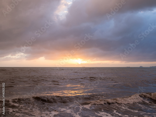 Storm sea and cloudy sky