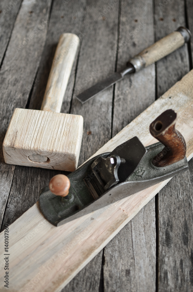 Carpentry tools on an old board table Carpentry tools on an old board table