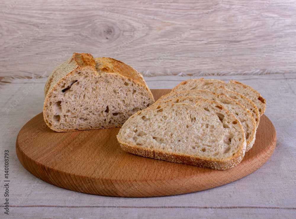 Sliced white bread on a cutting board Sliced white bread on a cutting board