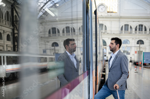 Wallpaper Mural Man entering the train Torontodigital.ca