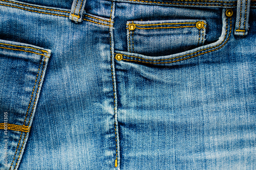 Denim Pants Elements as Background. Detail of jeans trousers close-up. Pockets, pants, belt loops, thick stitches. Elements of denim pants background Denim Pants Elements as Background. Detail of jeans trousers close-up. Pockets, pants, belt loops, thick stitches. Elements of denim pants background