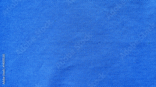 Fabric for clothing background. Blue cloth as blank backdrop